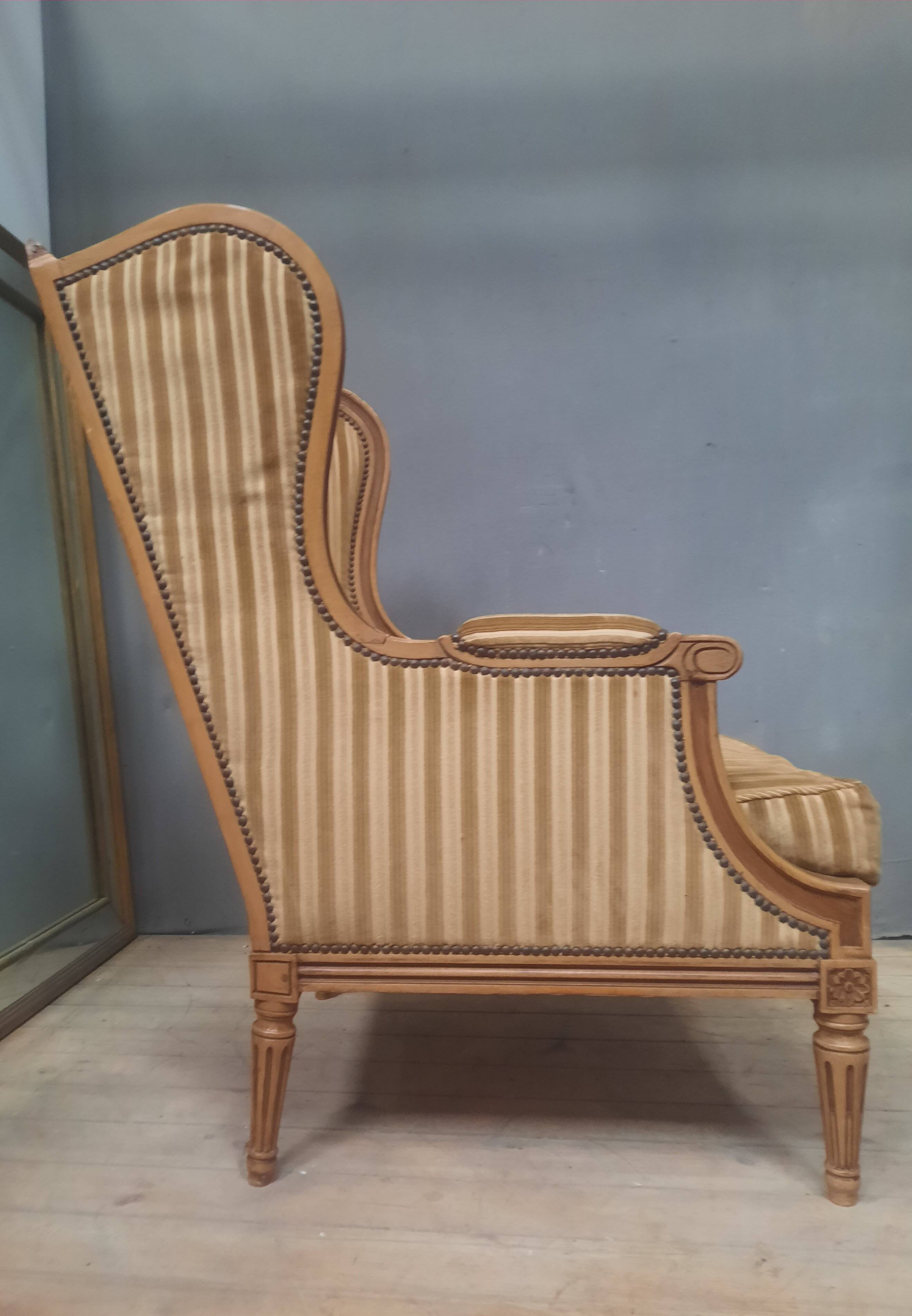 Large Louis XVI style wing chair