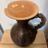Scarified ceramic vase with twisted handle - African style