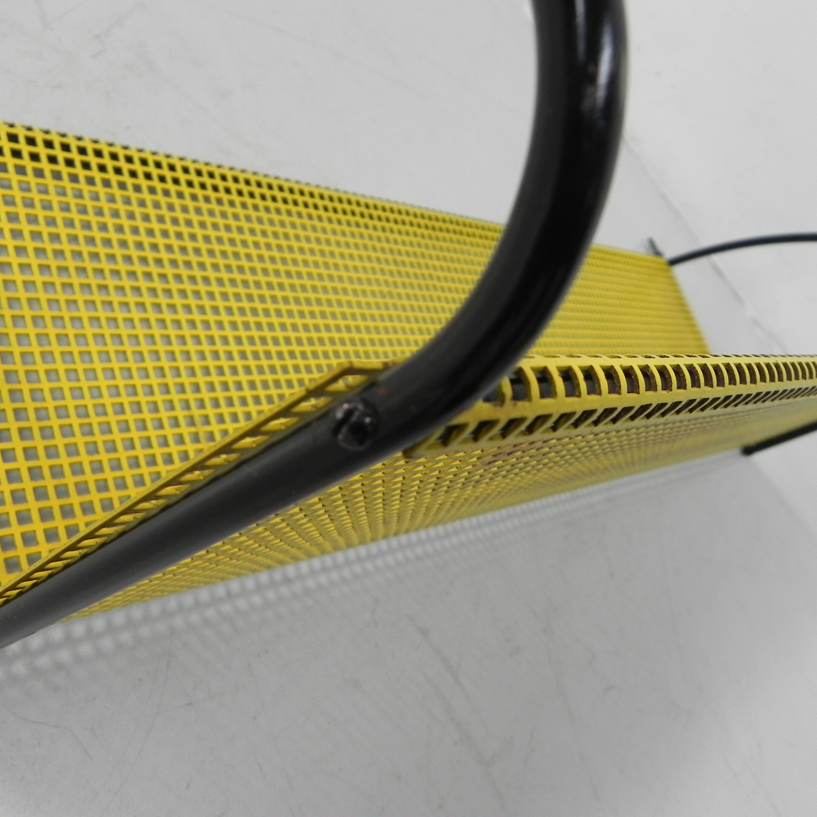 Pilastro wall rack with perforated steel plate