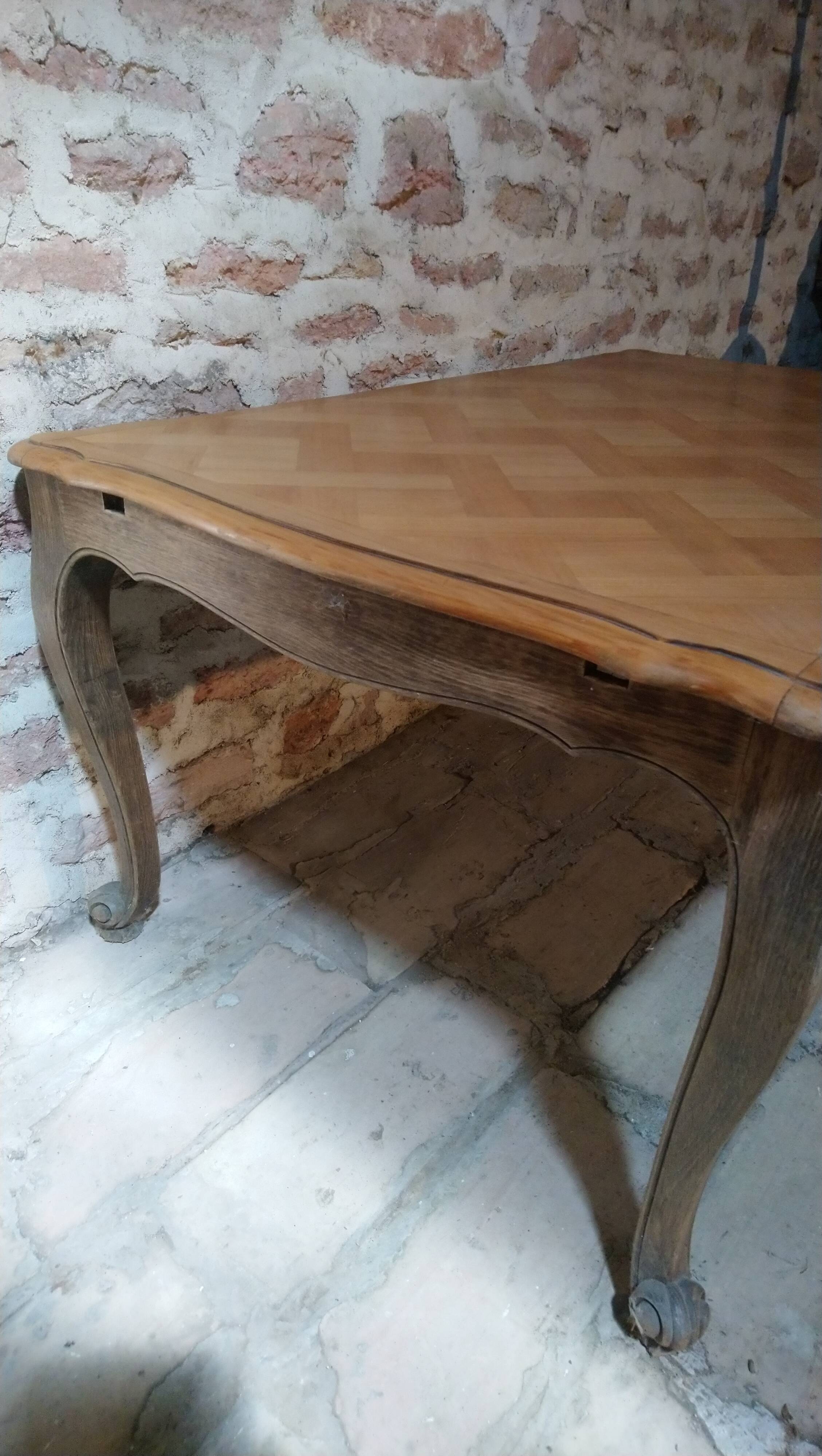 Louis XV style table in oak and cherry wood.