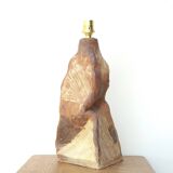 Brutalist sandstone lamp with raffia lampshade