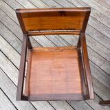 Rectangular dining table set and its suite of 6 armchairs in exotic wood and bamboo.