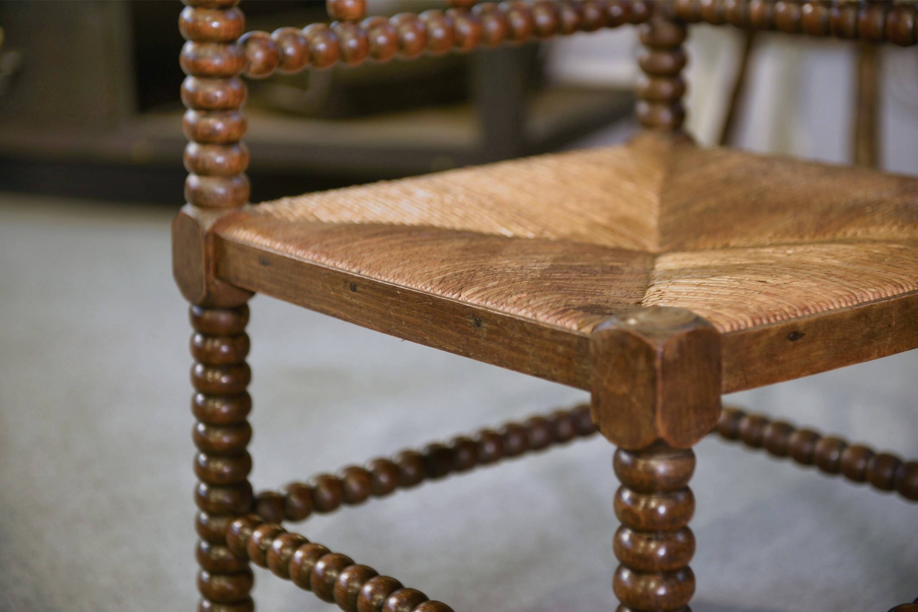 Pair of turned wooden corner chairs from the 1950s.