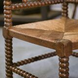 Pair of turned wooden corner chairs from the 1950s.