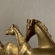 Hook for keys or tea towels in gilded brass with carved horse decoration