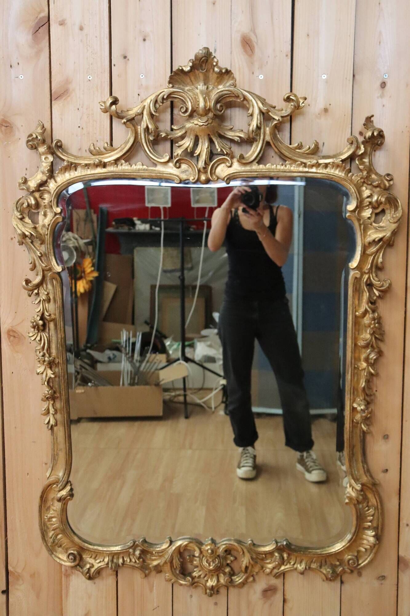 Golden wooden mirror in Louis XV style