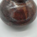 Copper vase with metallic reflections
