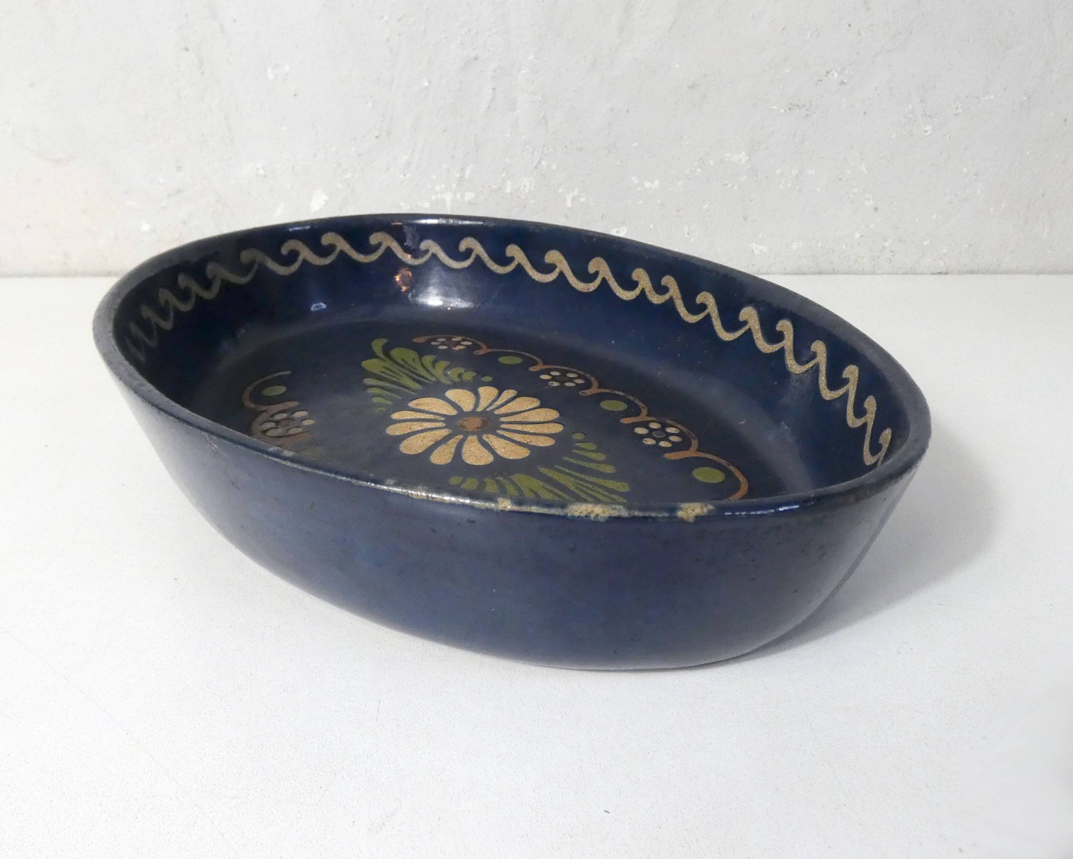 old glazed terracotta dish