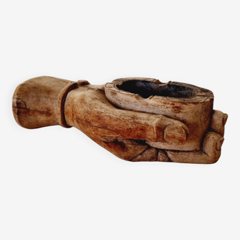 Strange ashtray carved from wood and depicting the very realistic sculpted hand of a Hindu God