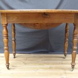 Table ovale Louis Philippe à rabats, en merisier  Ø120-108 x 74 cm