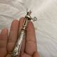 Silver duck sleeve clips, 19th century neck brace