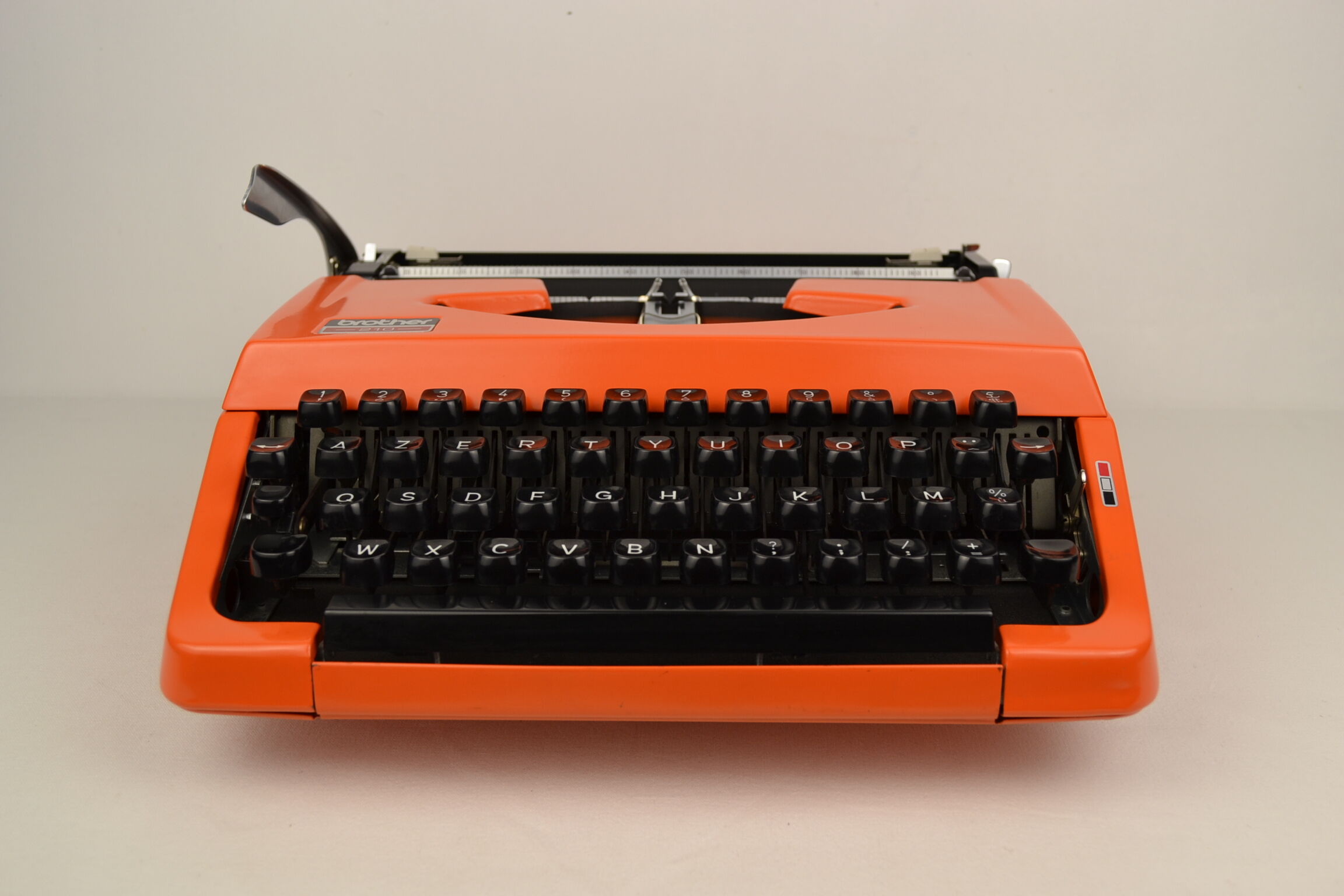Typewriter Brother 210 orange 1970s