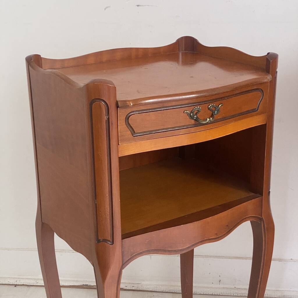 Pair of Louis XV style bedside tables in cherry wood.