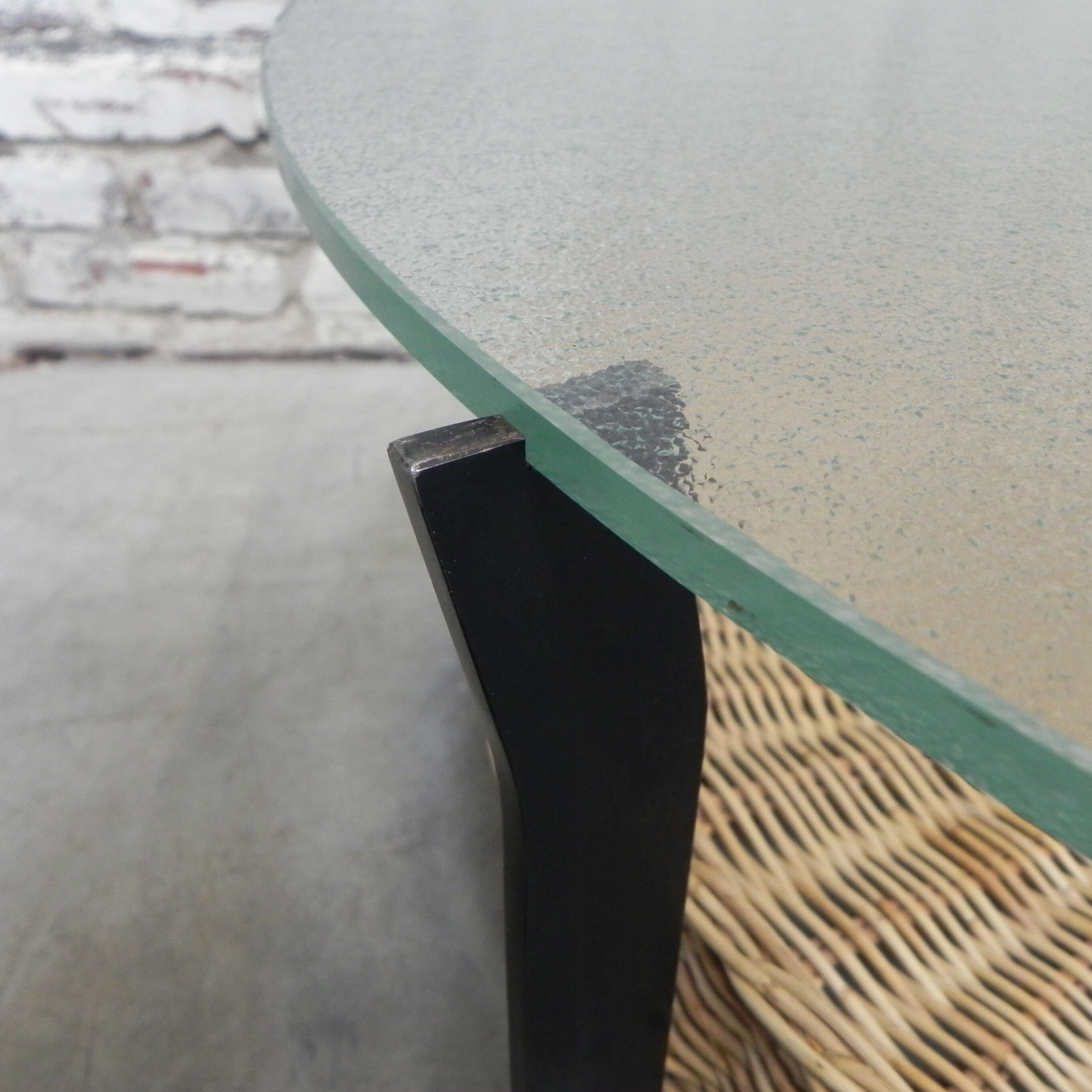 Vintage coffee table with glass top and rattan basket