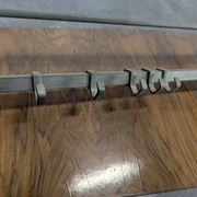 Railway style coat rack