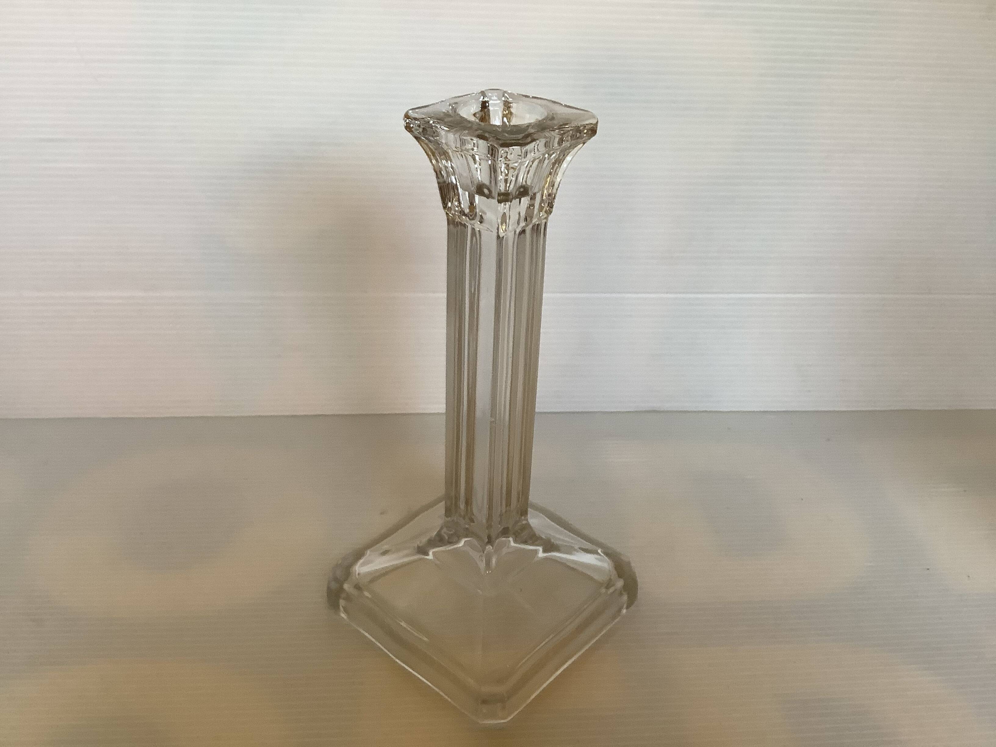 Four old square molded glass candlesticks