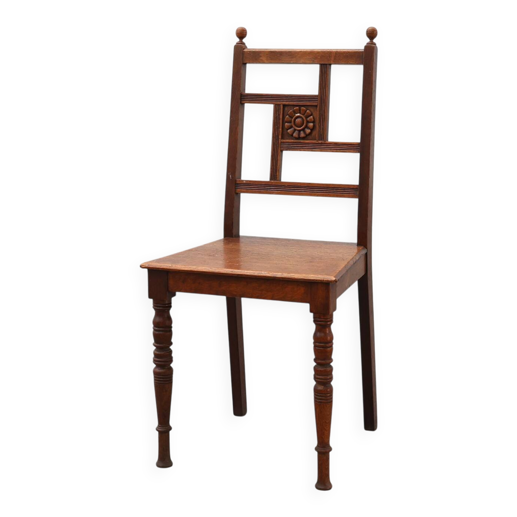Art Deco oak side chair with carved rosette back and turned front legs, Bel