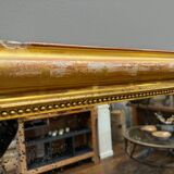 Old gilded fireplace mirror