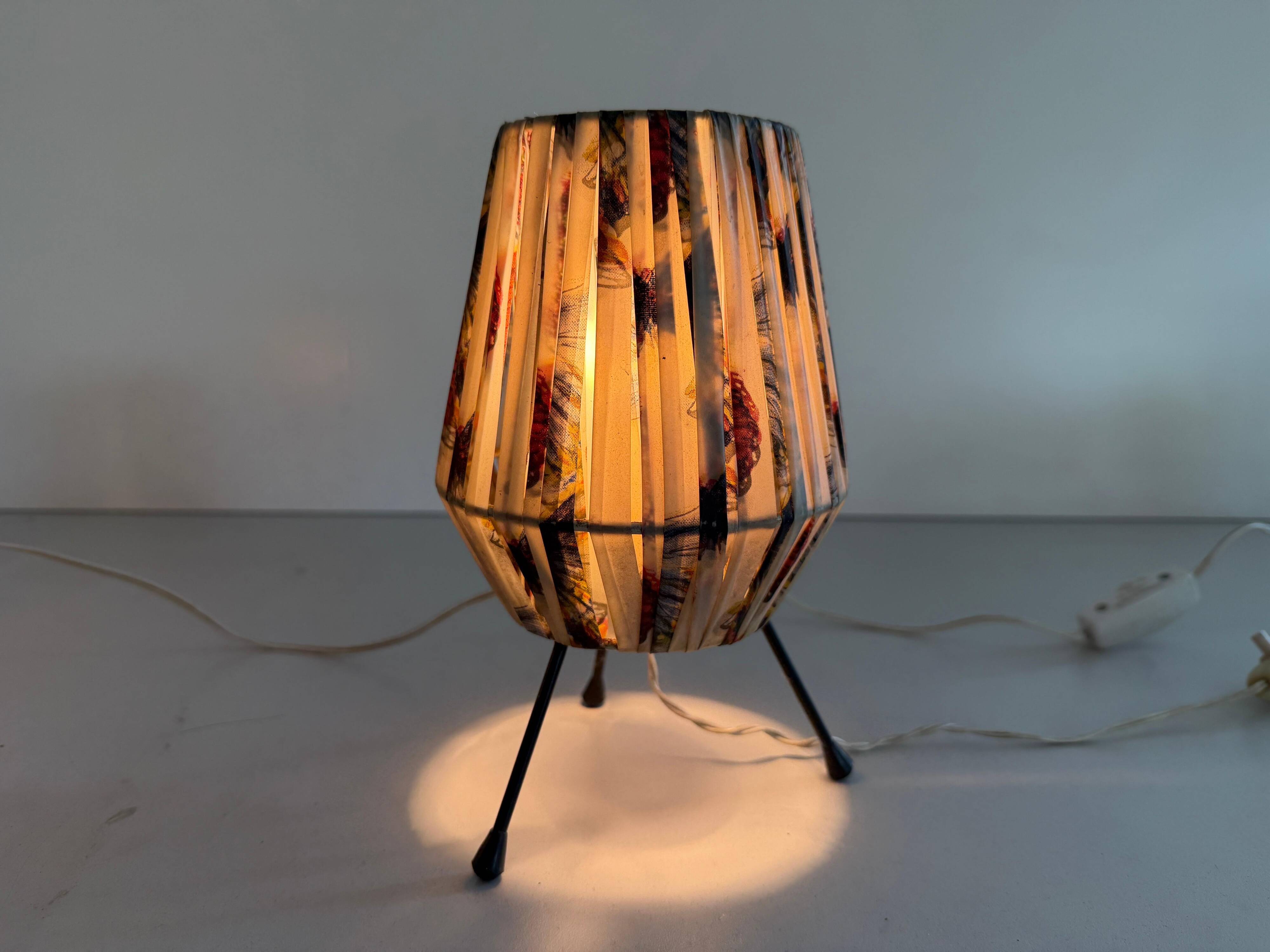 Pair of table lamps with plastic shades and tripod base, 1960s, Italy