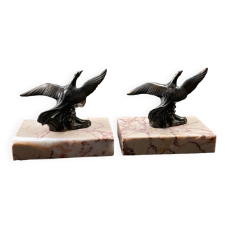 Pair of marble bookends with bronze birds