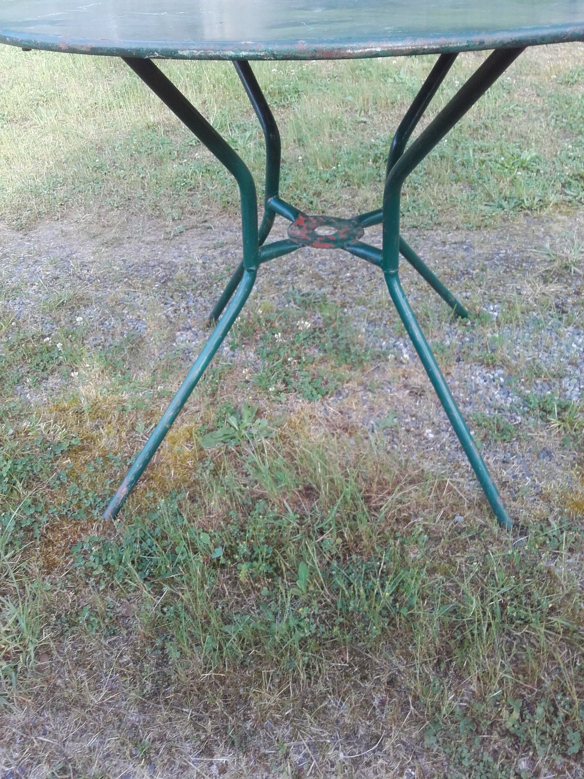 Old-house bistro table in wring iron