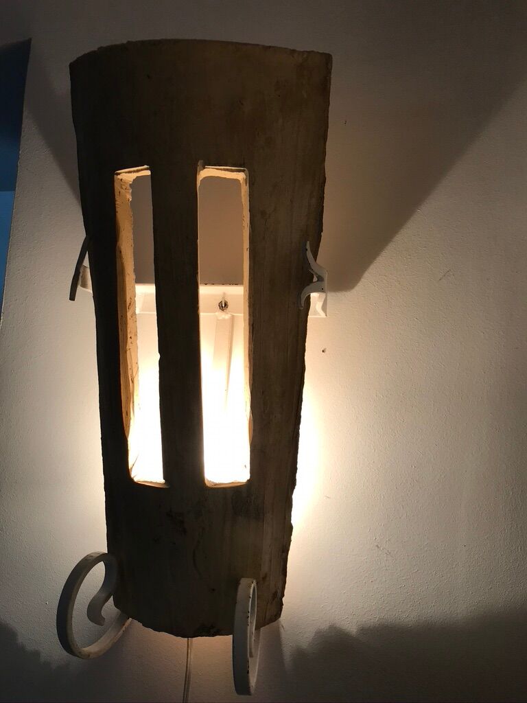 Lot of three terracotta and wrought iron appliques