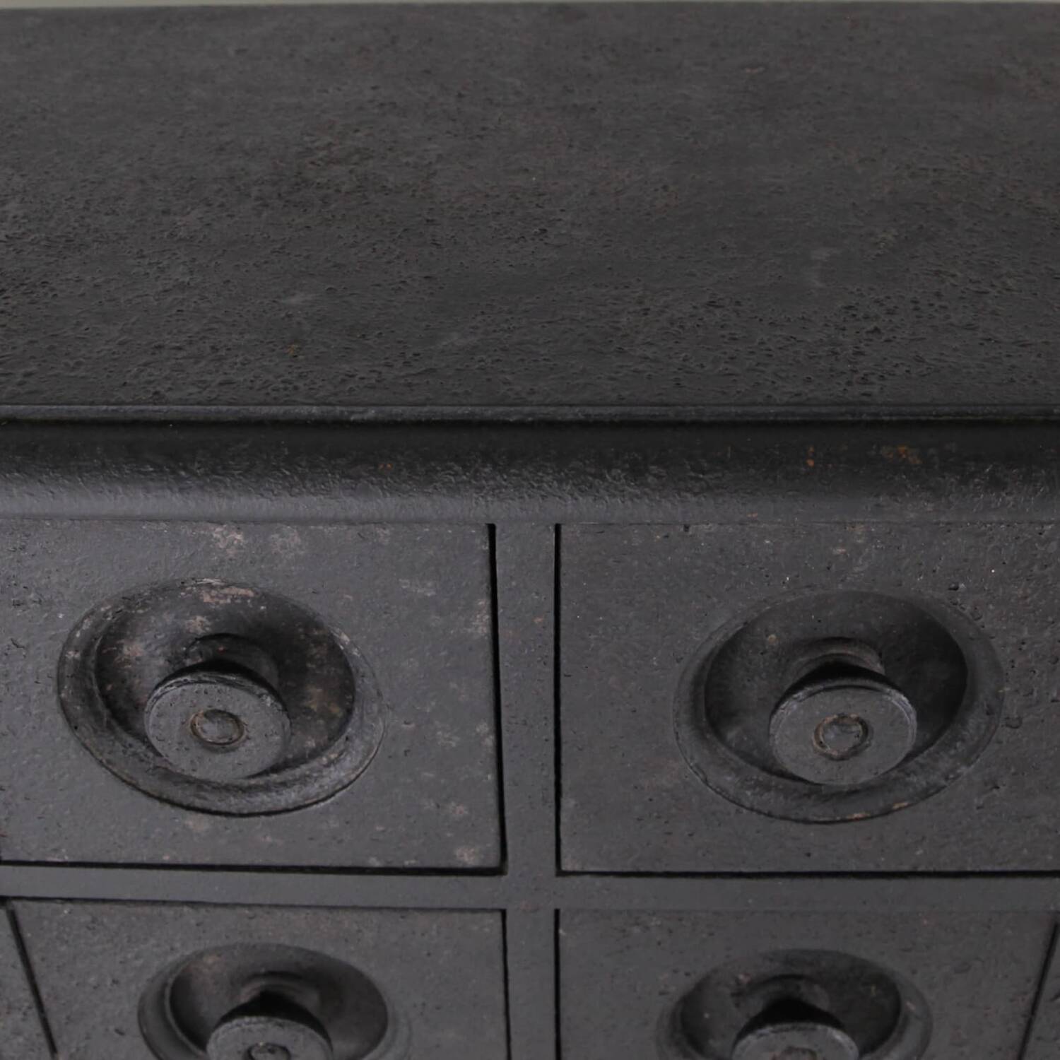 Blackened wooden chest of drawers