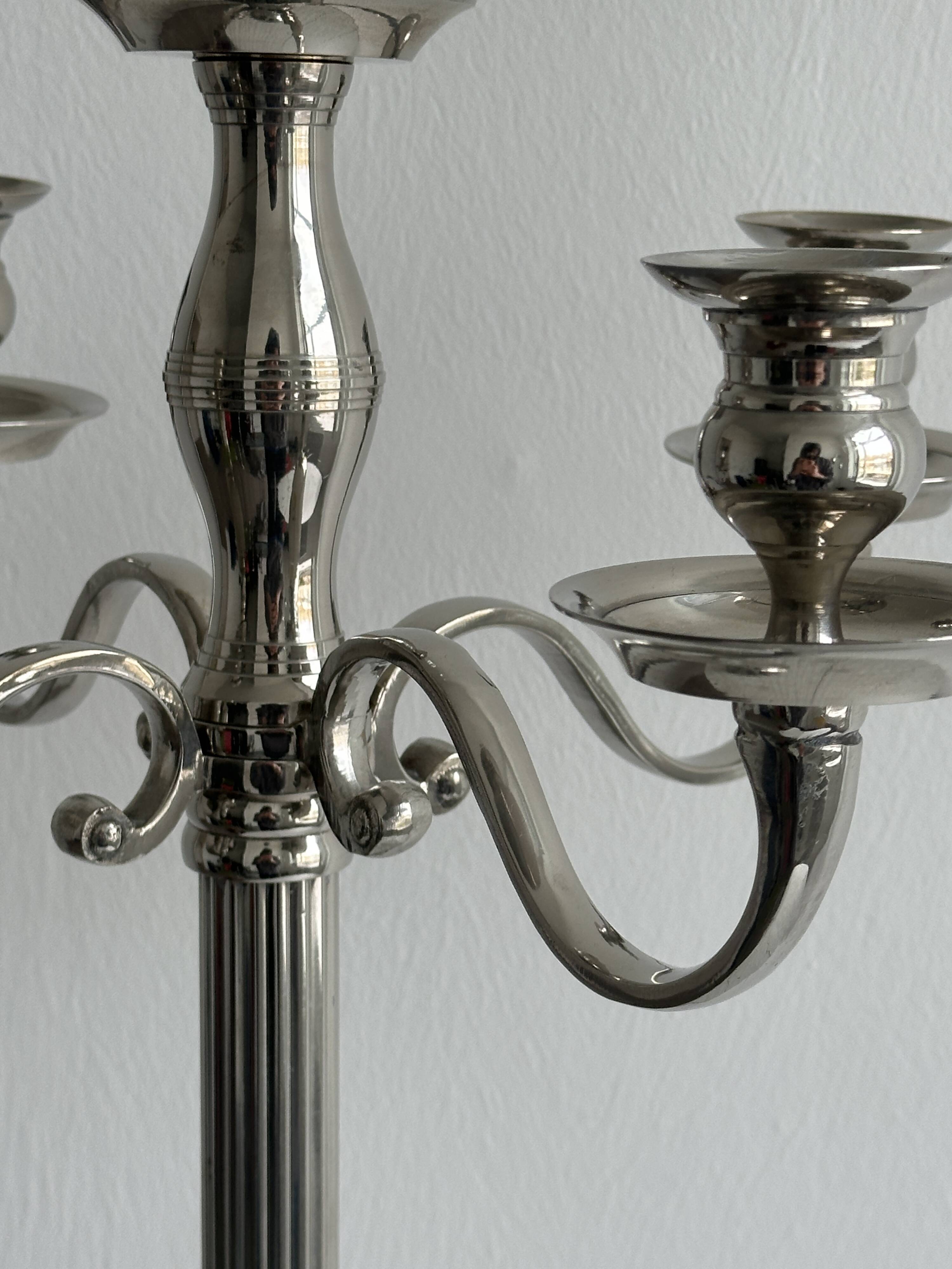 Large 5-arm candlestick in shiny silver metal
