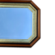 Beveled hexagonal mirror with cut wooden sides, gilded edging decoration