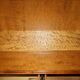 Vintage walnut burr buffet with glass and lighting, Art Deco style.