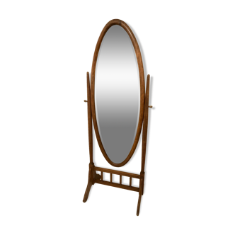 Old large psychic mirror on wooden stand