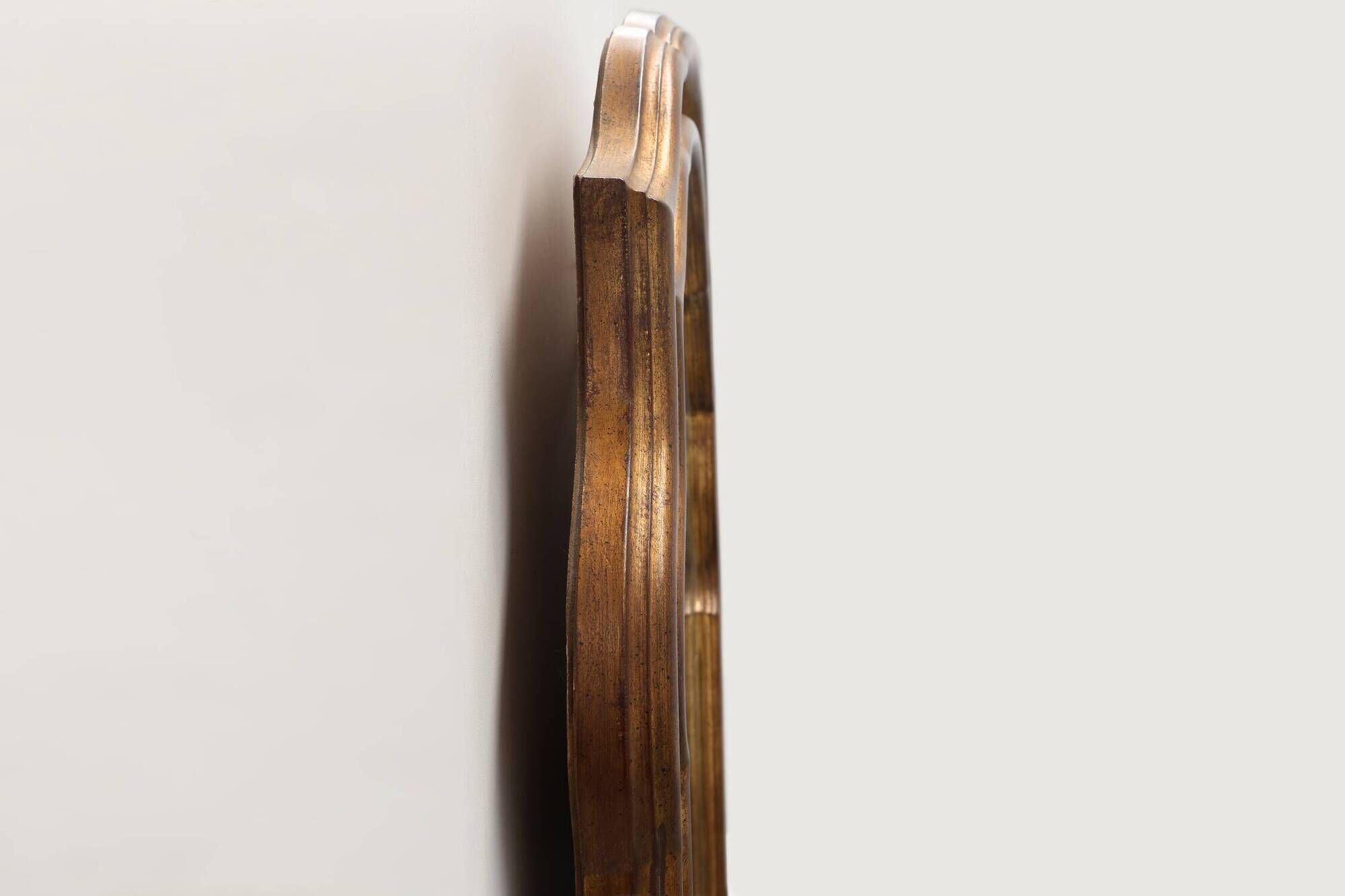 Arched gold-leaf mirror with marbled glass border by Deknudt, Belgium, 20th