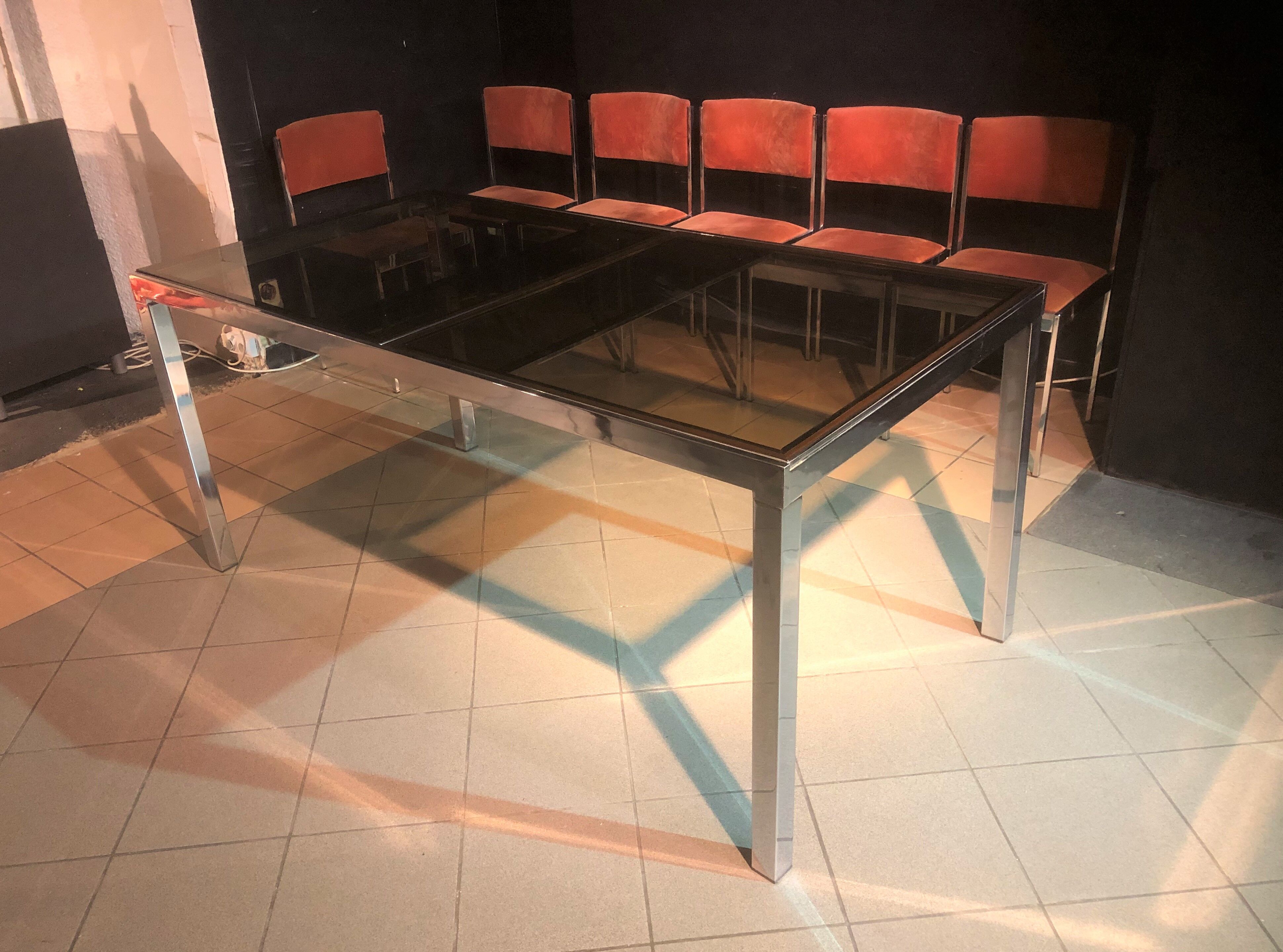 Rectangular table by Milo Baughman and 6 chairs