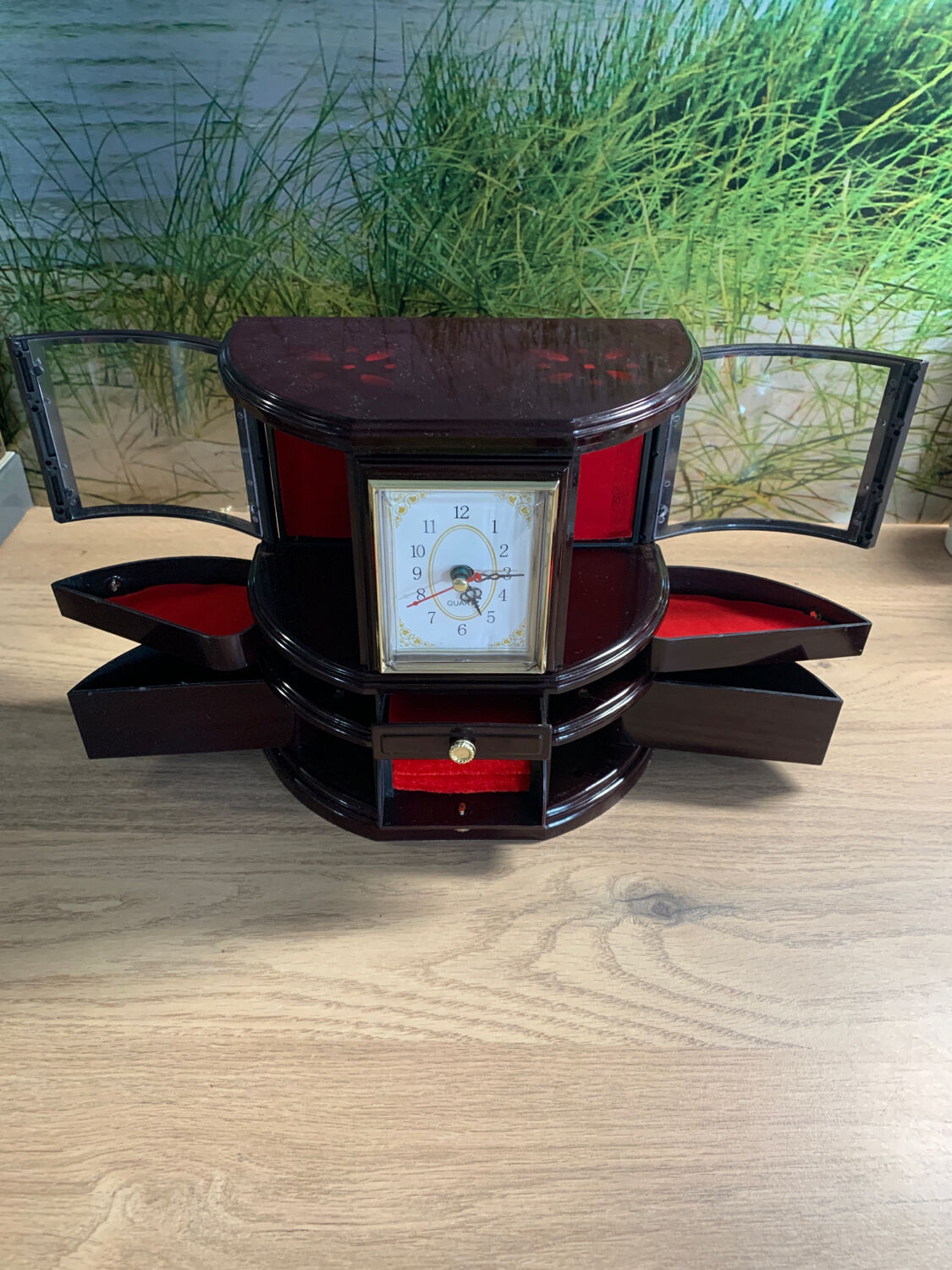 Jewelry cabinet with clock
