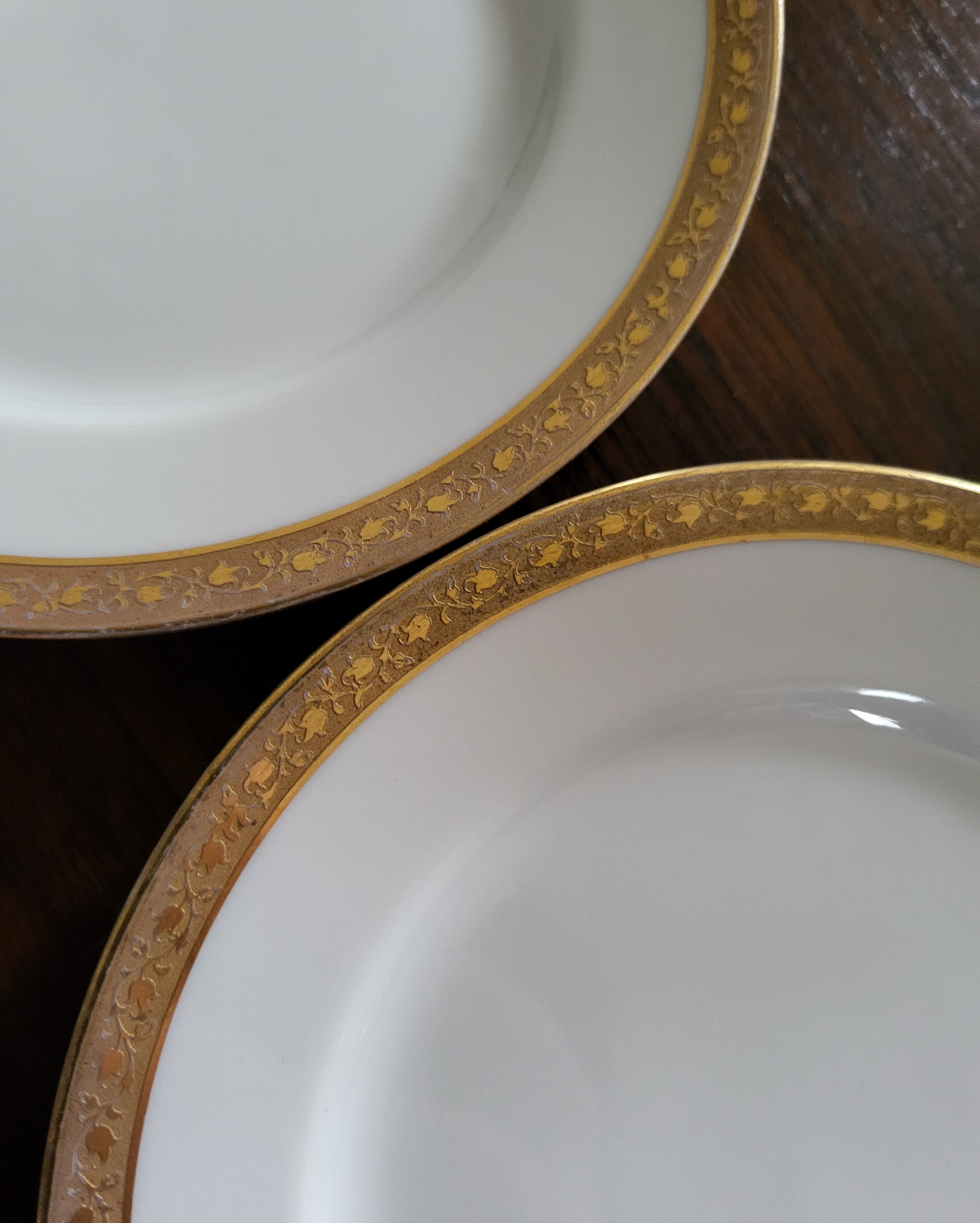 Lot of 8 small porcelain bread plates.