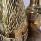 Duo of embossed brass vases
