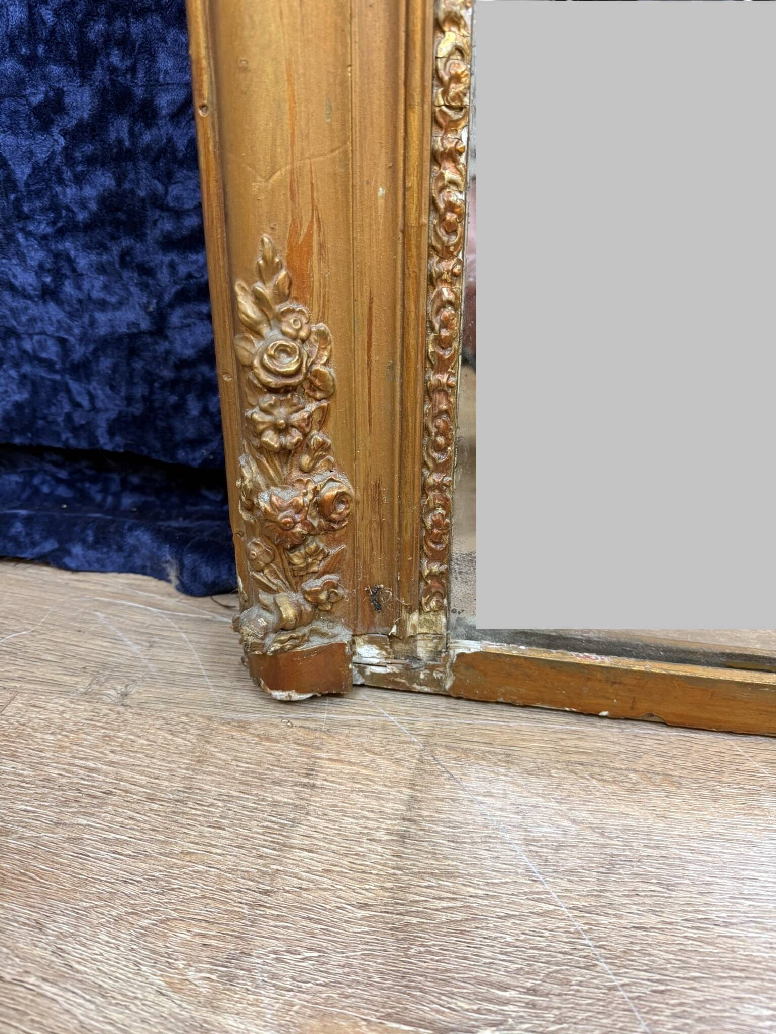 Empire period mirror in wood and gilded stucco circa 1810-1820