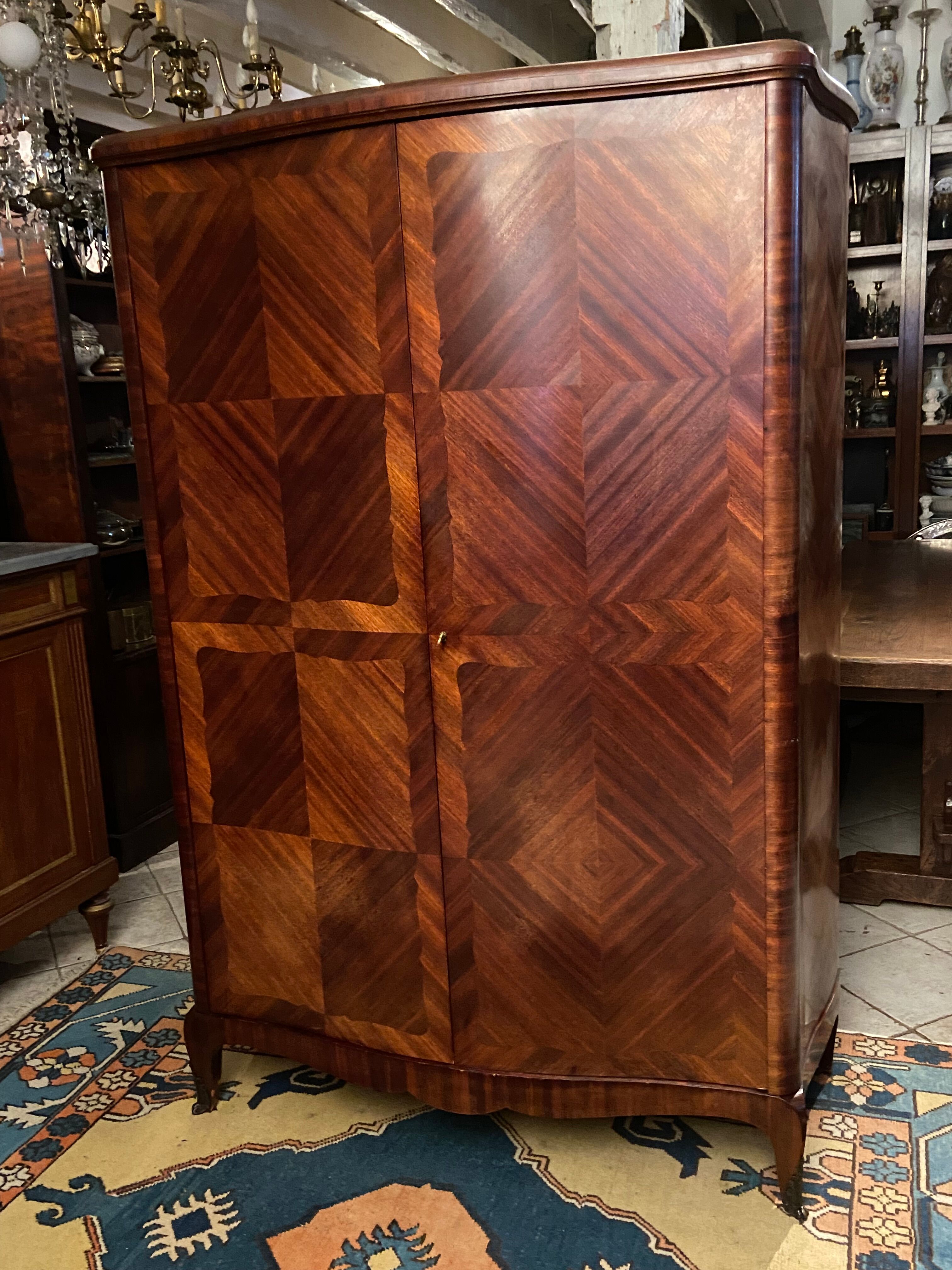 Domed wardrobe with Louis XV style inlaid decoration