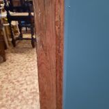 Mirror in golden wood