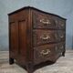 Louis XV/XVIII period Lyonnaise commode in moulded and carved walnut.