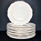 Sarreguemines series of 12 flat plates in opaque faience cream "terre de fer"
