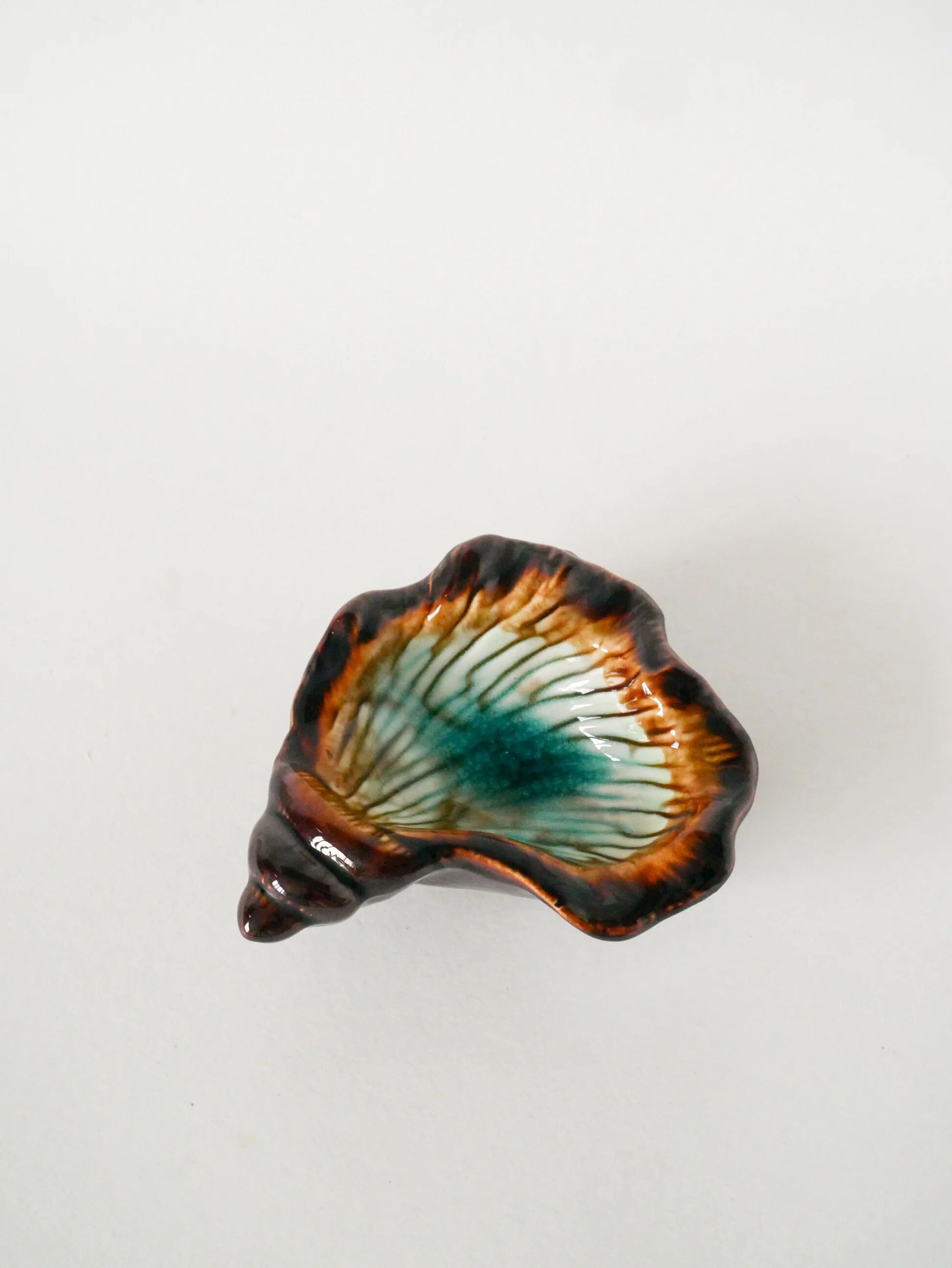 Ceramic shell-shaped catchall, brown and blue, 1970.
