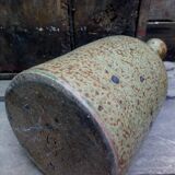 Bottled sandstone vase with a narrow neck