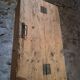 Antique French workshop cabinet in pine with compartments.