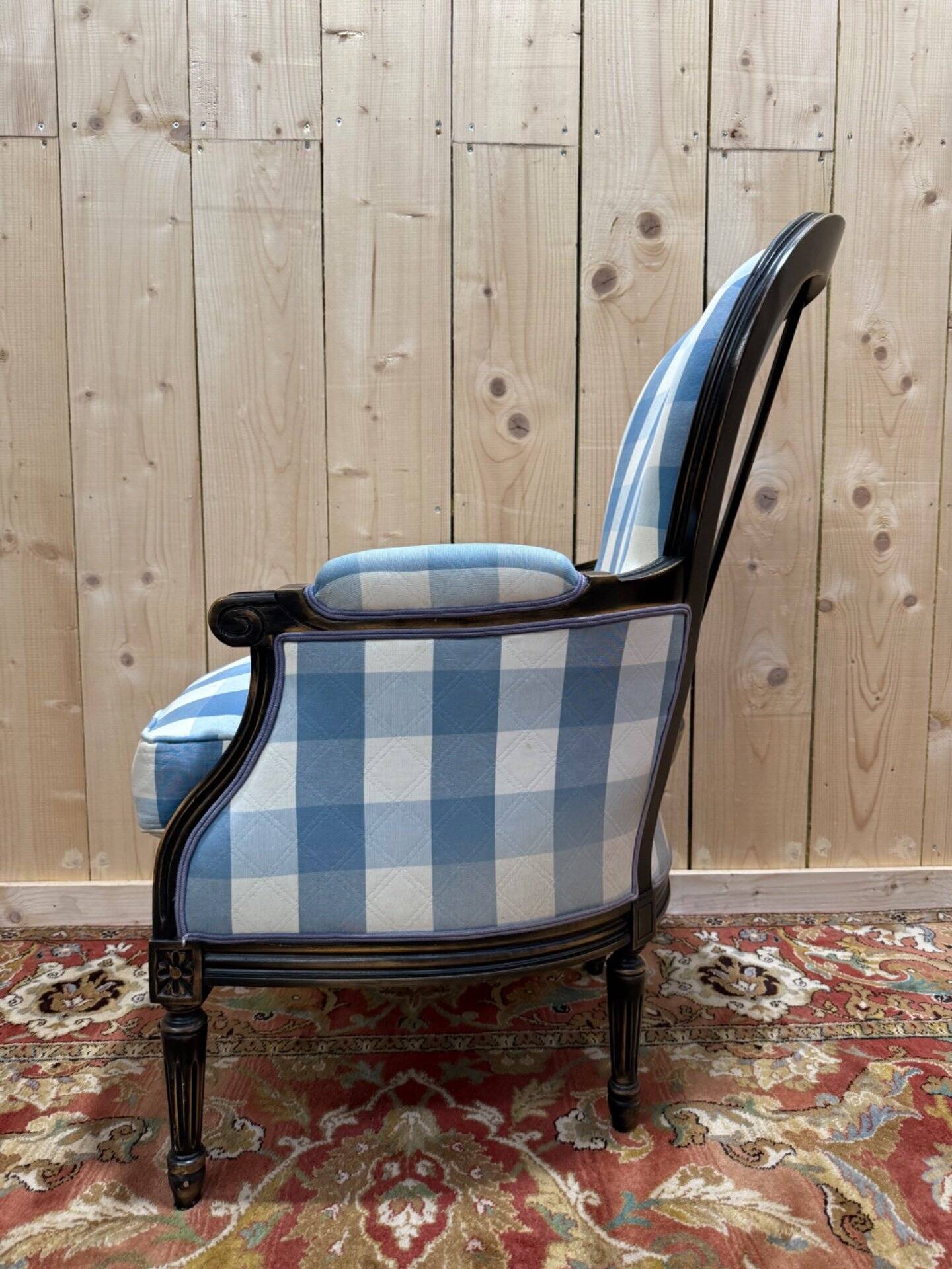 Louis XVI style bergère armchair in blackened wood