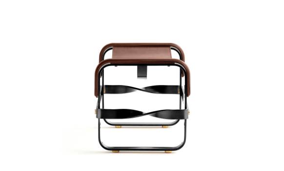 Smoky steel footrest in black and dark brown leather, contemporary style.
