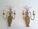 Pair of brass and crystal wall sconces
