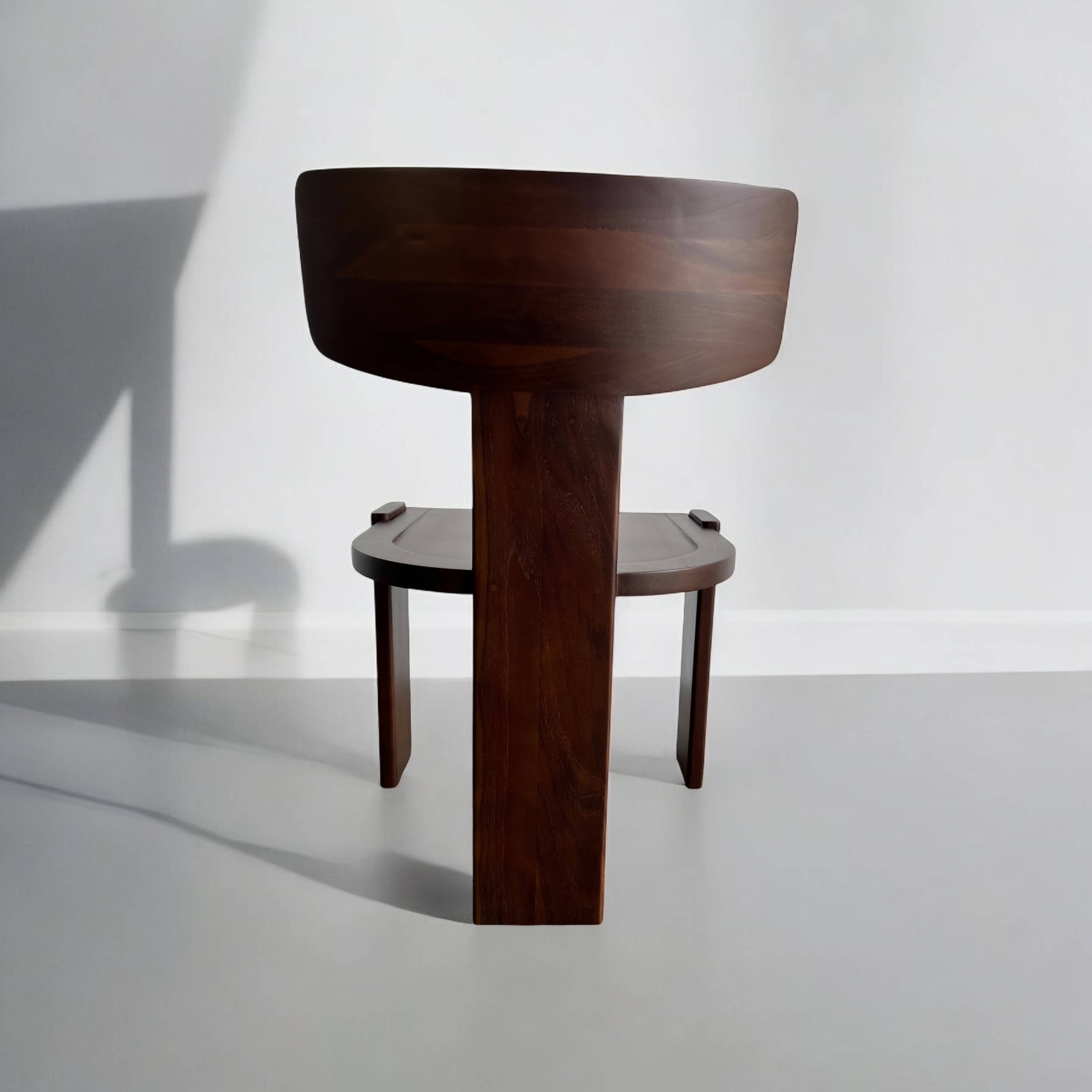 Retro brutalist chair in dark solid wood