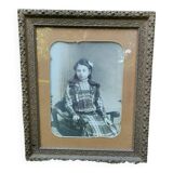 Framed portrait of a young girl.