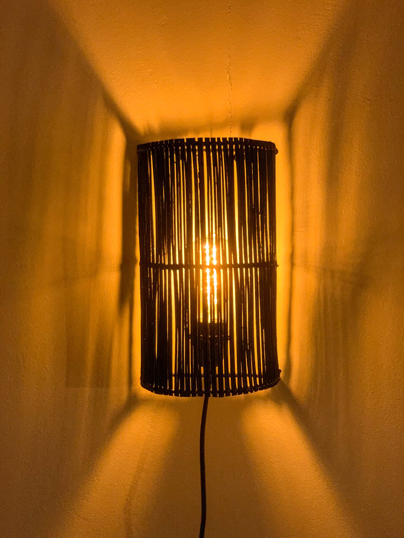 Black rattan wall light